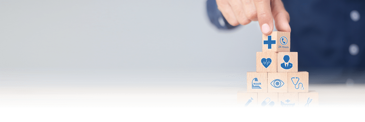 Hand arranging wood block stacking with icon healthcare medical, Health insurance - concept 