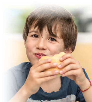 Tasty sandwich eaten by a child